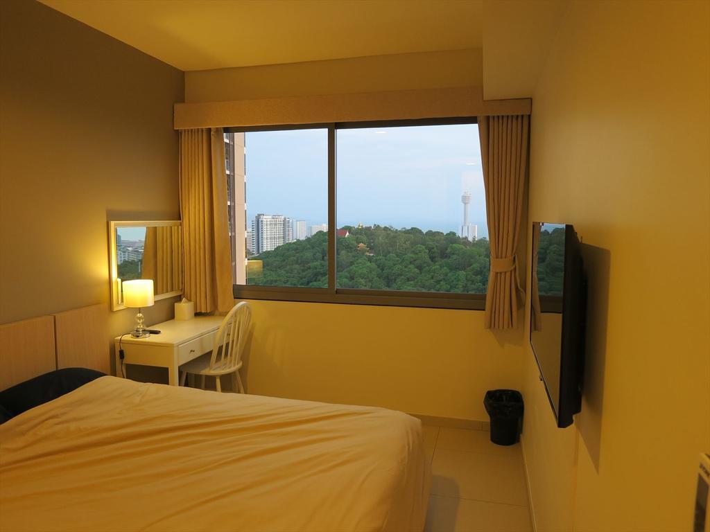 Jp'S Unixx Residence Club Pattaya Habitación foto